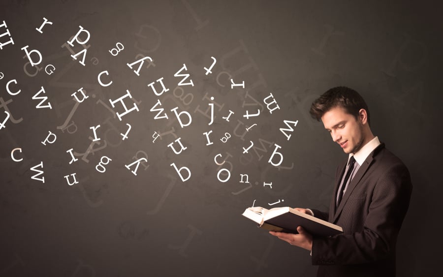Man with Book and alphabet